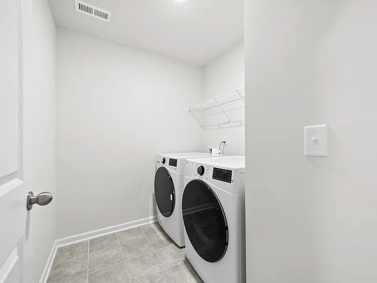 Laundry room with washer/dryer