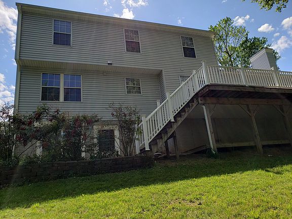 back view of house & decks