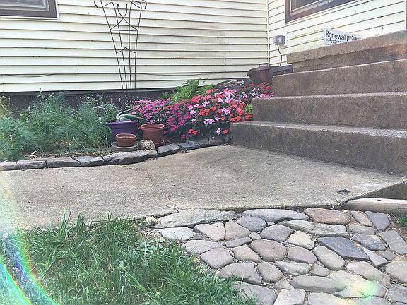 Rock walkway by sunroom door