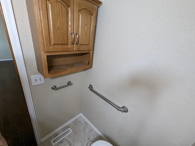 Extra storage in half bath.
