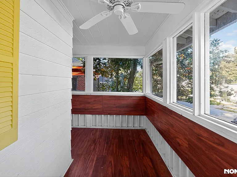 WRAP AROUND ENCLOSED PORCH WITH 3 CEILING FANS