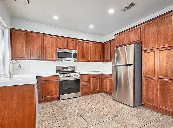 5th image of 12889 High Vista St