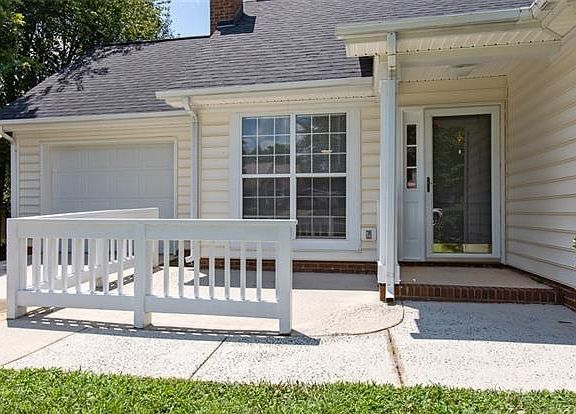 You'll appreciate the roof over the entryway when it rains and the cute front patio.