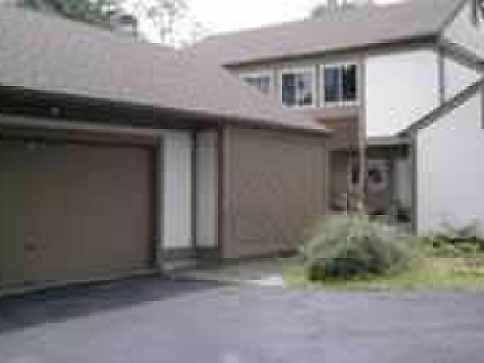 Front, 2 car garage, additional parking space