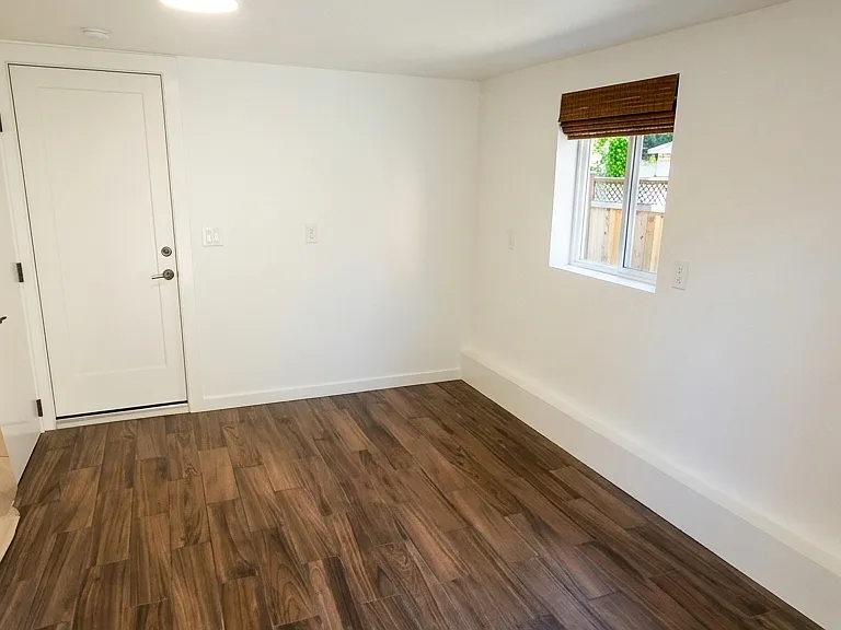 Downstairs flexible use utility room.