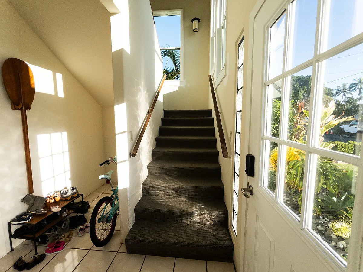 Entrance to the upstairs unit. - Paopua Loop