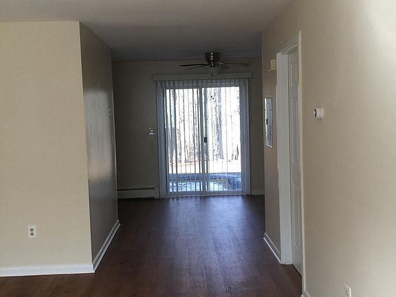 Open concept living room looking through to Dining room