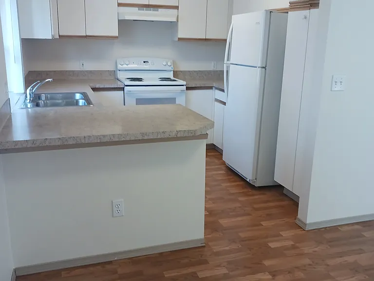 Spacious kitchen and dining room area.