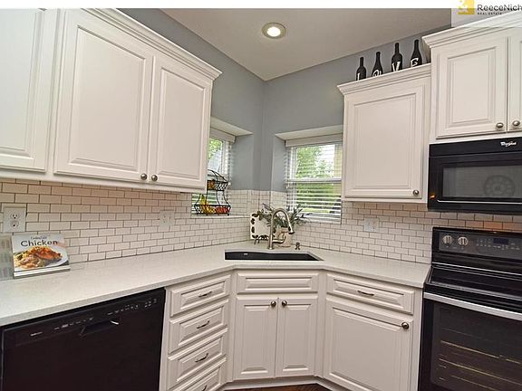 Newly remodeled kitchen with subway tile and granite counters!