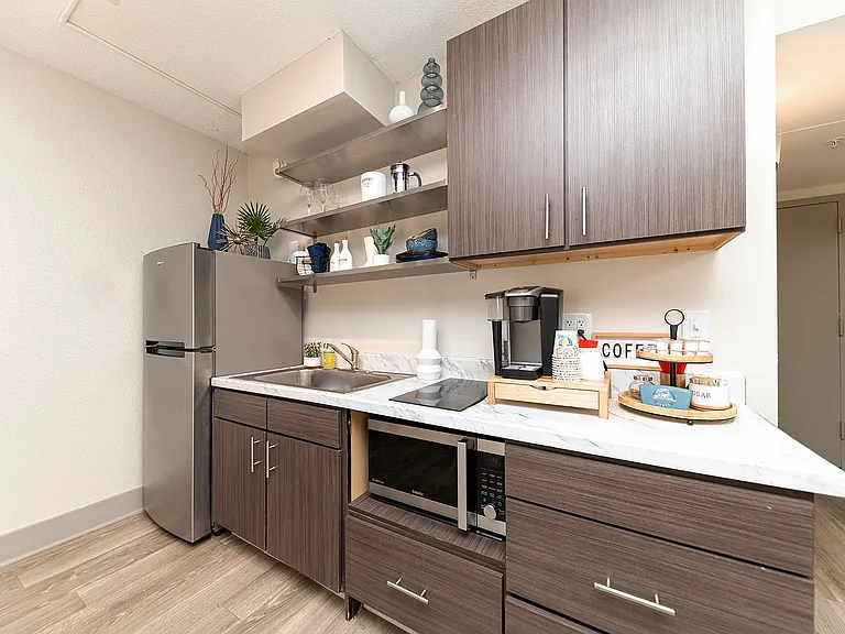 Kitchen with granite counters and stainless appliances