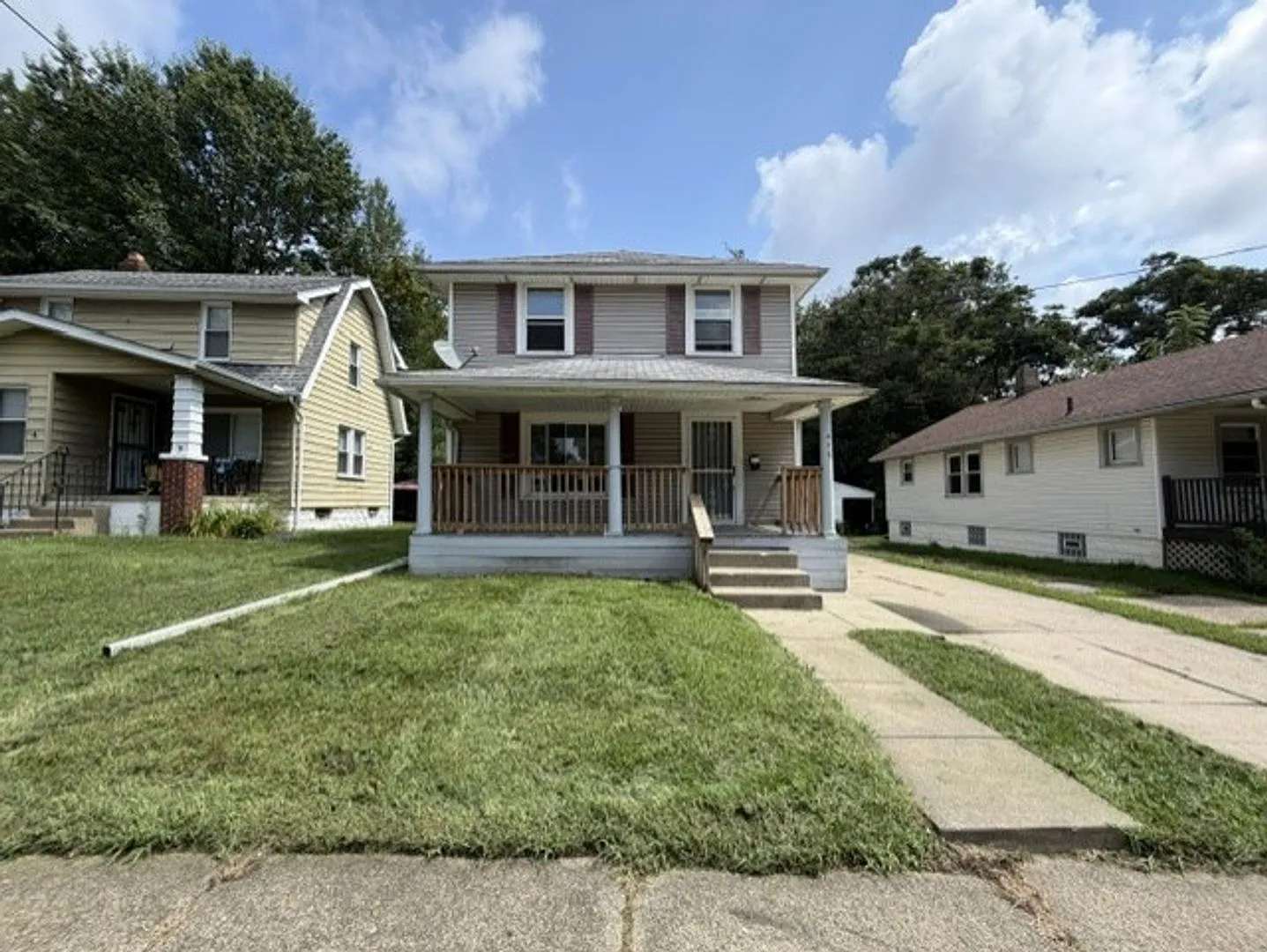 Spacious 3-Bedroom Akron Home with Central Air, Full Basement & Large Backyard — Photo 1
