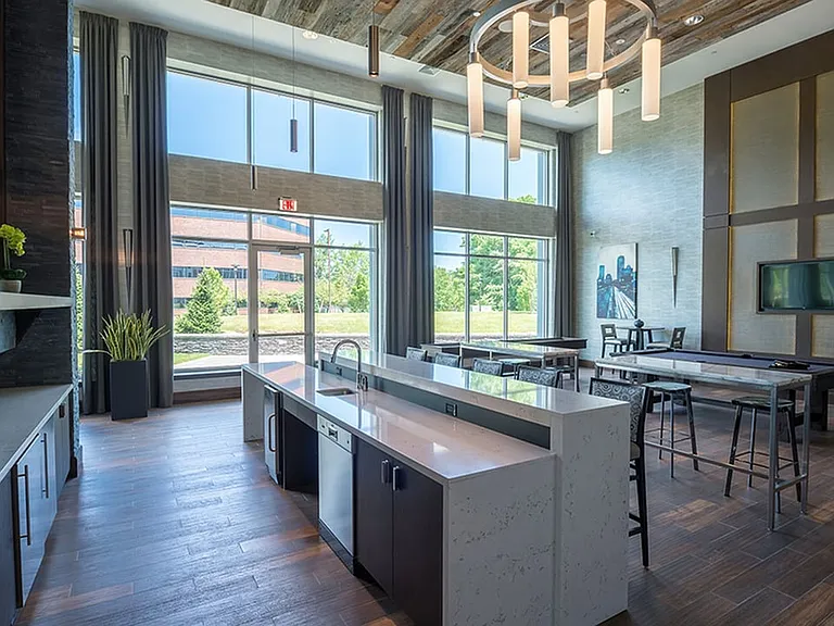 Soaring ceiling heights and well appointed finishes in this resident lounge