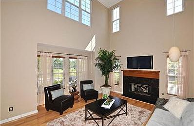 Wow! NEWLY PAINTED! You won't find this dramatic 2-story Great Room in another townhouse in Carmel!