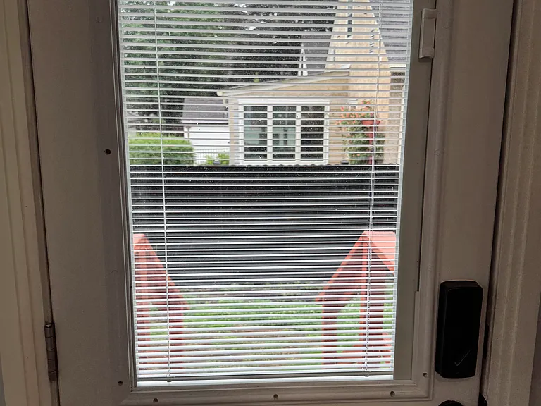 door to backyard fenced area