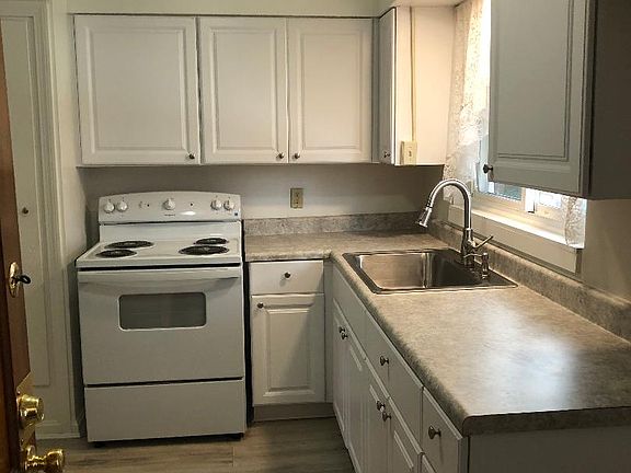 Kitchen with Stove and Refrigerator