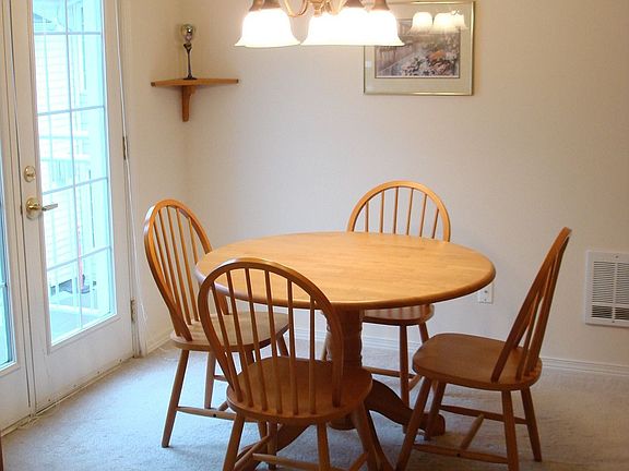 Dining area with door to balcony