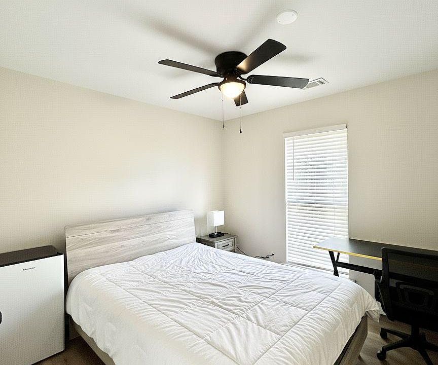Private room w Queen bed, brand new mattress, desk and personal mini fridge.