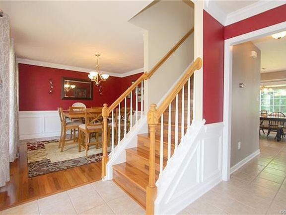 Entry Foyer featuring Ceramic Tile welcomes you to this lovely home. Note the Picture Framing.
