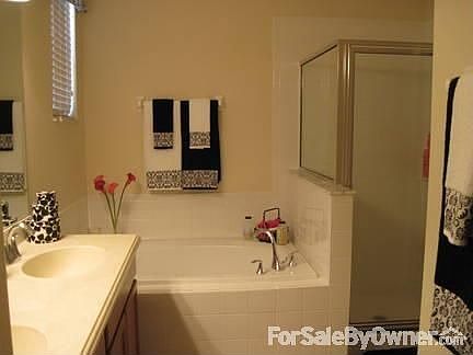 Master bath, double sinks, garden tub and stand up shower.