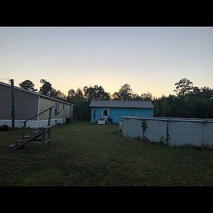 Back yard pool & building