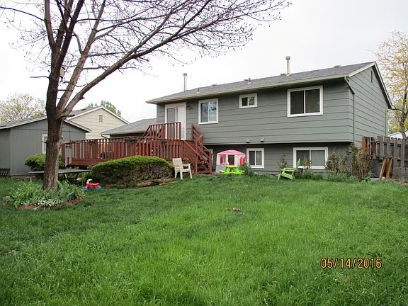 Rear of home large fenced yard