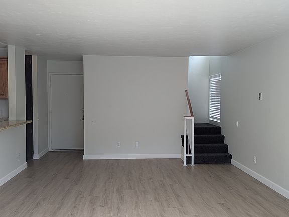 Entrance with spacious storage space under stairway