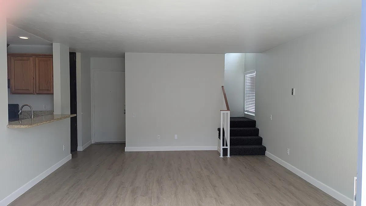 Entrance with spacious storage space under stairway - 4064 Huerfano Ave #273