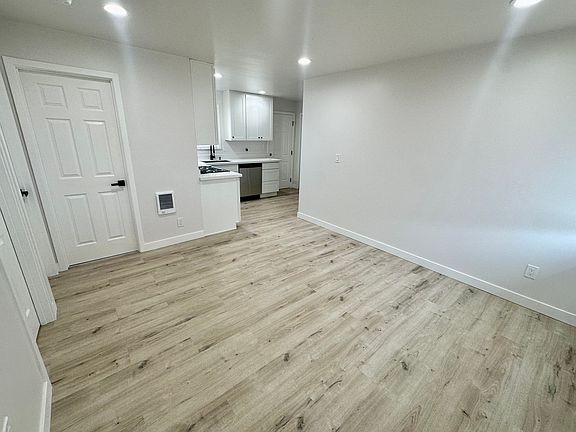 Open living room concept of living room into kitchen