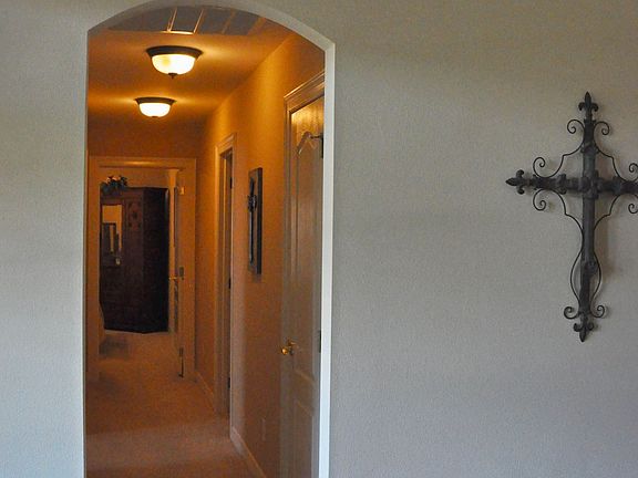 Hallway to bedrooms,bath,laundry room and garage