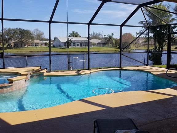 Pool & Lake View from Covered Patio