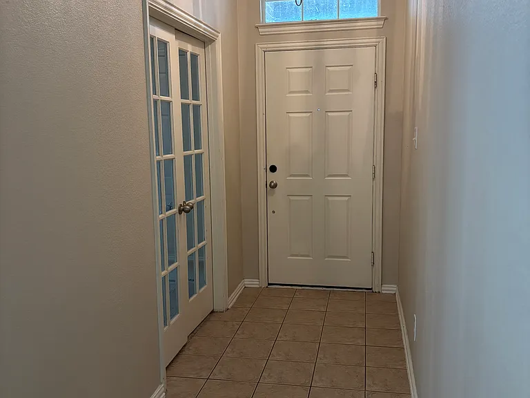Front door and Hall. Office or 4th Bedroom to the Left