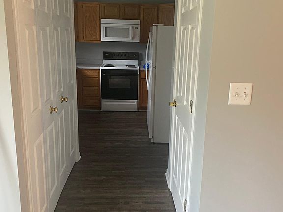 Washer and Dryer hook-ups on left behind double doors.