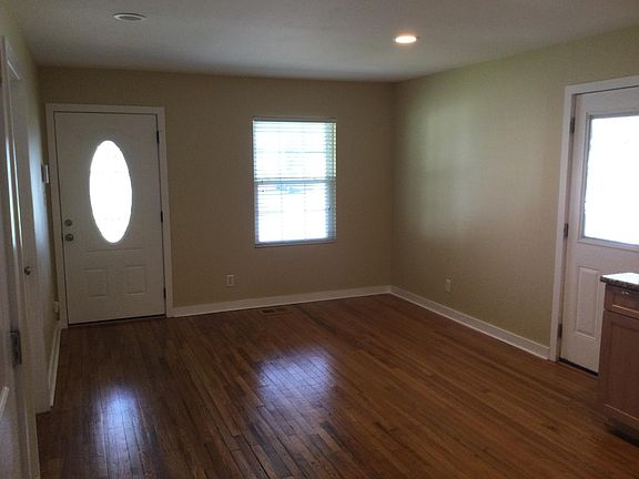 Dining area just inside front door.