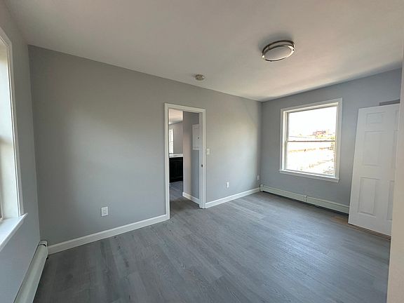 largest bedroom holds a king plus dressers or desk
