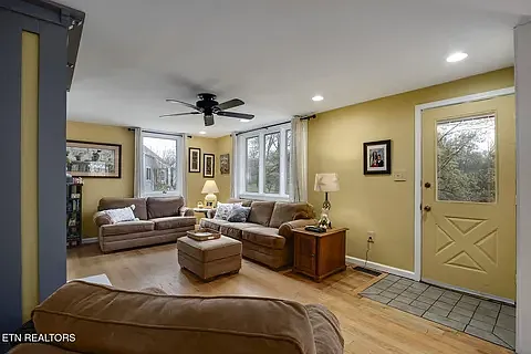 Living room with front door shown.