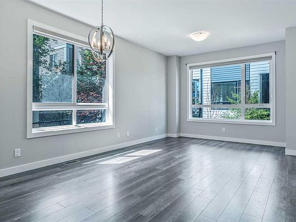 3rd image of 810 N Redstone Cres NE
