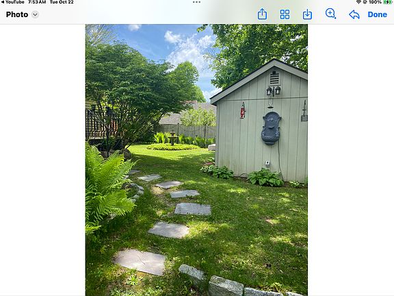 Sunny yard and fountain