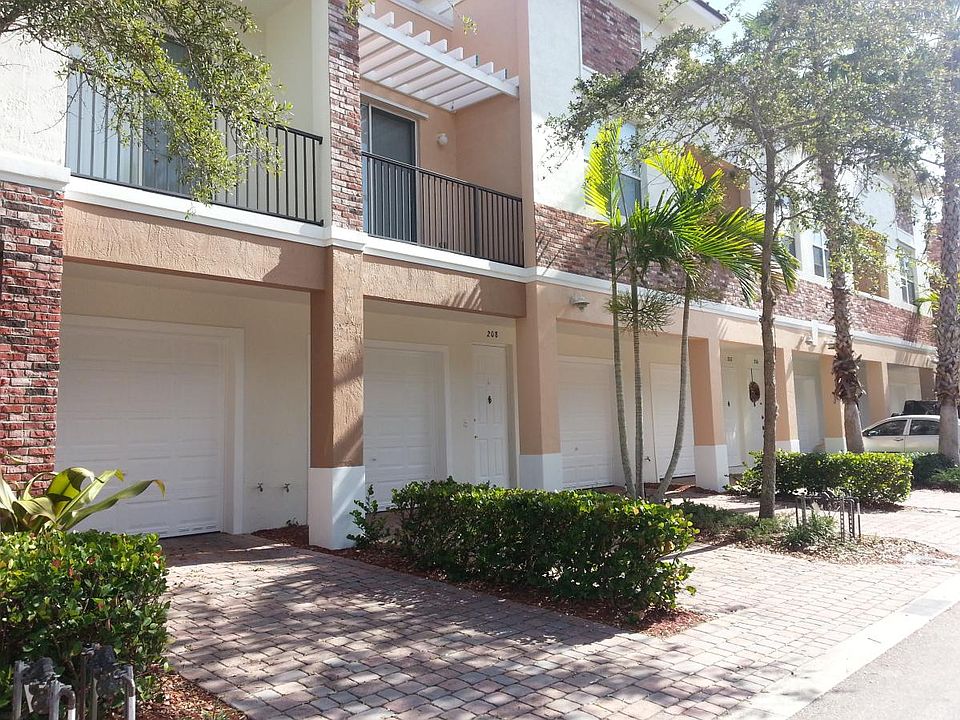 Back of Condo - with Garage