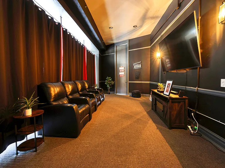 movie room, theater seating, curtains West Hill Apartments KC