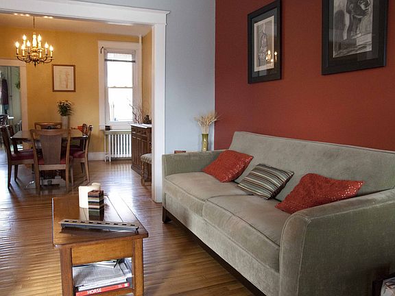 Original hardwood floors with inlaid detailing. Anderson windows throughout