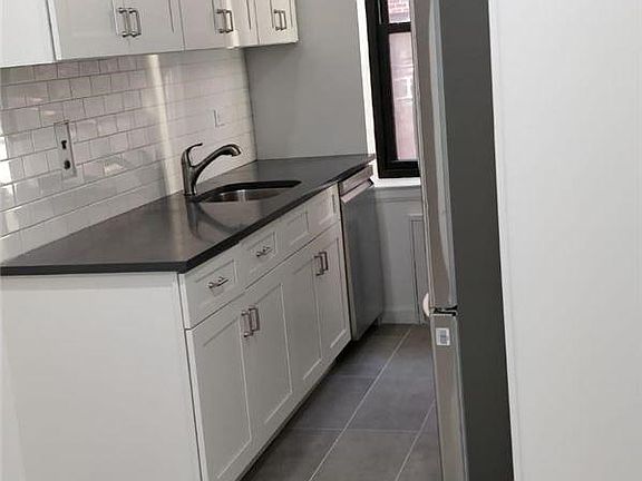 5th image of 3223 88th St APT 203