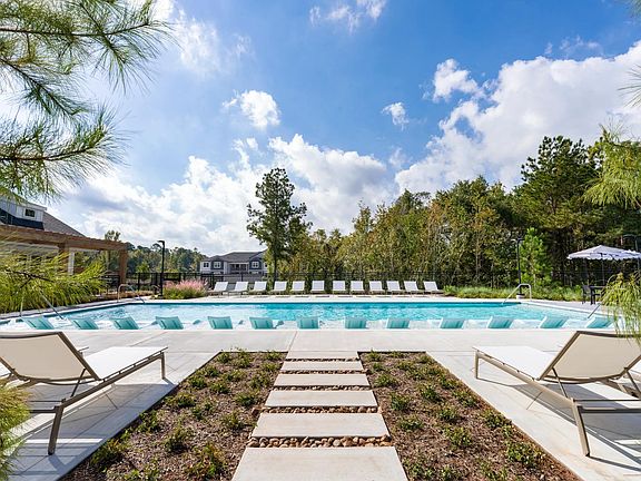 Our resort-style pool features in-pool seating for ultimate comfort and a spacious sundeck perfect for soaking up the rays.
