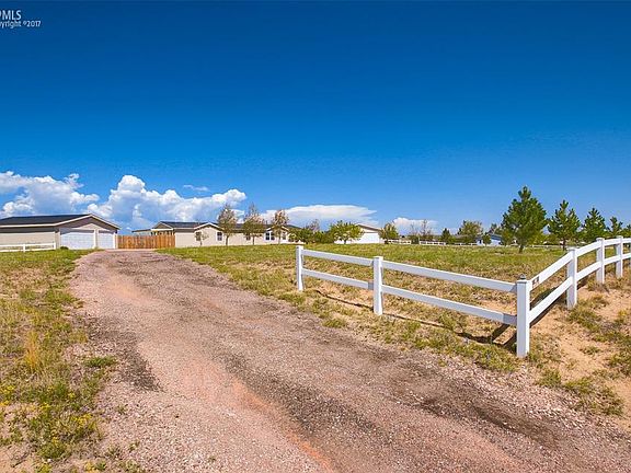 WOW...(2) Three Car Garages!