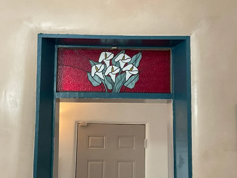 Stained glass in clerestory in living room, custom made