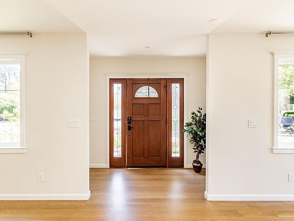 Foyer entry to Living, Dining & Kitchen space