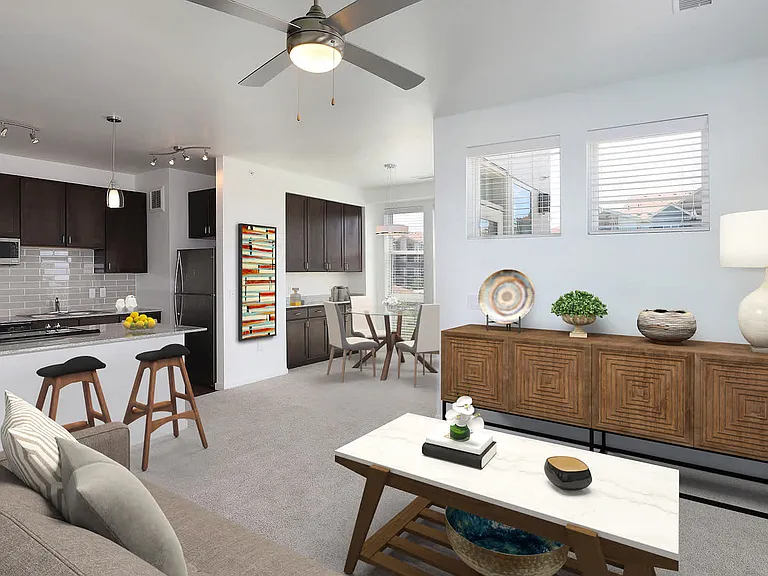 Kitchen and Carpeted Living Room