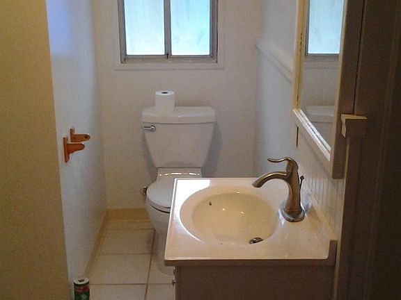 Front bath has laundry hook ups