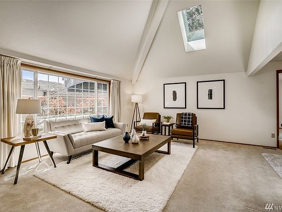 Enter to soaring ceilings and 1 of 6 skylights!  