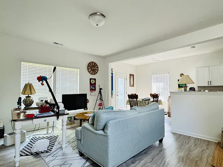 Open-concept living and dining area_