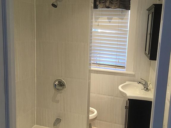 Bathroom (floor to ceiling tile)